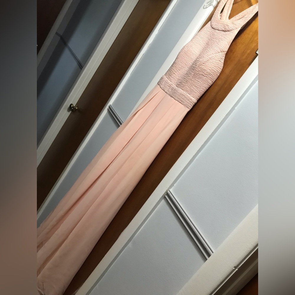 Beautiful light peach long formal. Size 9 worn for a beauty pageant.